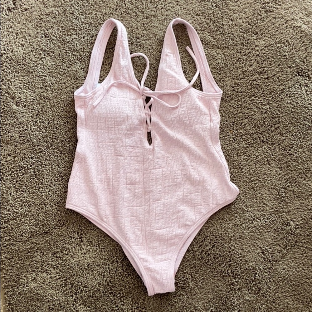 Billabong light pink one piece in EUC